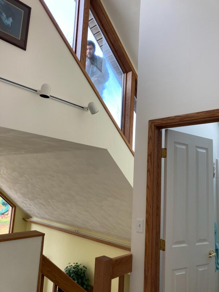 Owner of 814 Window Washing cleaning hard to reach window